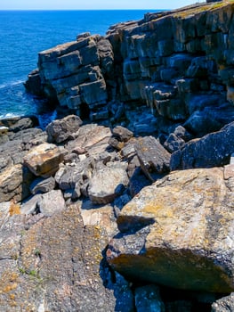 Coastal cliffs from the north side of Serpent's Zmiinyi Island, Ukraine photo