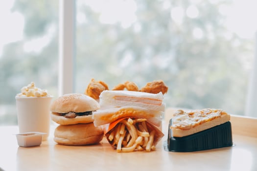 Closeup of home made burgers on wooden background photo
