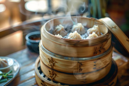 Steaming dim sum in bamboo baskets photo
