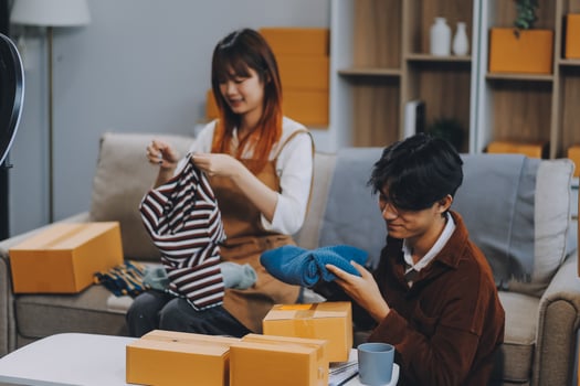 Small business owners couple entrepreneurs working with parcel, e-business, marketing, online shop, sme, entrepreneurs photo