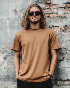 A model with long hair confidently displays a blank t-shirt photo