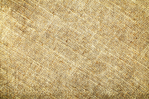 Natural Linen Material Textile Canvas Fabric Texture Background Close-up Detail of Fabric Natural Color Hemp Material Pattern Design Wallpaper. Can be Used as Background or For Graphic Design photo