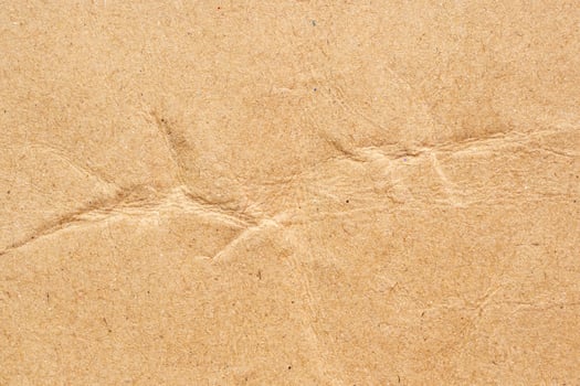 Abstract crumpled and creased recycle brown paper texture background photo