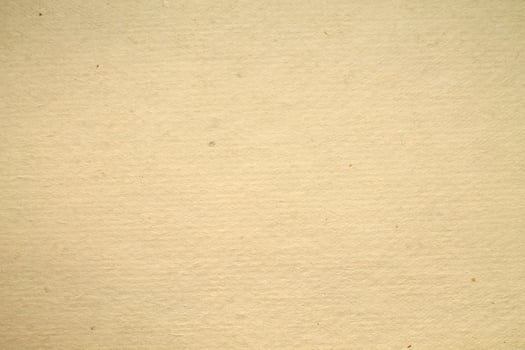 A brown paper texture with a few holes photo