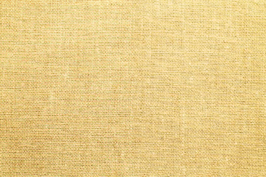Natural Linen Material Textile Canvas Fabric Texture Background Close-up Detail of Fabric Natural Color Hemp Material Pattern Design Wallpaper. Can be Used as Background or For Graphic Design photo