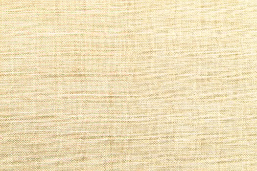 Natural Linen Material Textile Canvas Fabric Texture Background Close-up Detail of Fabric Natural Color Hemp Material Pattern Design Wallpaper. Can be Used as Background or For Graphic Design photo
