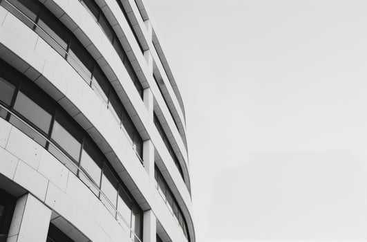 Modern Architectural Building With Sleek Lines and Large Windows in Urban Setting photo