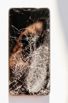 damaged LCD screens of mobile phones are collected as electronic waste waiting for valuable metals inside LCD screens be sorted for reuse reducing e-waste in nature and increasing value of e-waste. photo