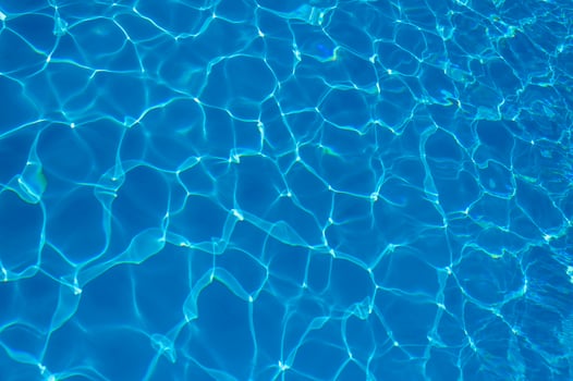 The reflection of the suns rays in the water in the pool with sea water, The glare of the sun, Egypt photo