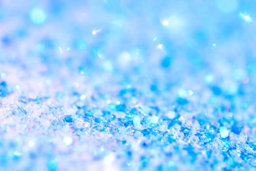 Abstract blue background with sequins. A beautiful magical bokeh. photo