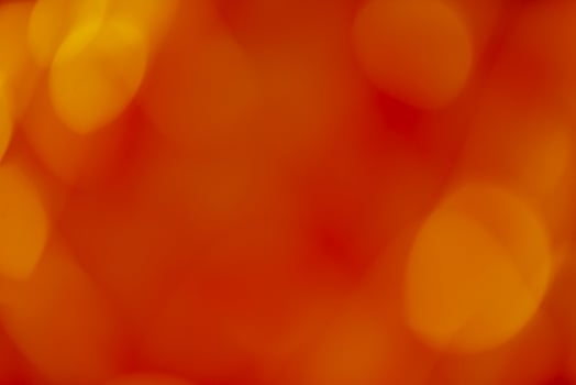 Defocused Red and orange holiday bokeh. photo