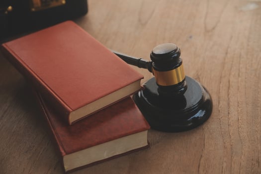 Lawyer, legal advisor, businessman brainstorming information on agreement details Business contracts in legal processing books for accuracy in contract documents. joint financial investment. photo