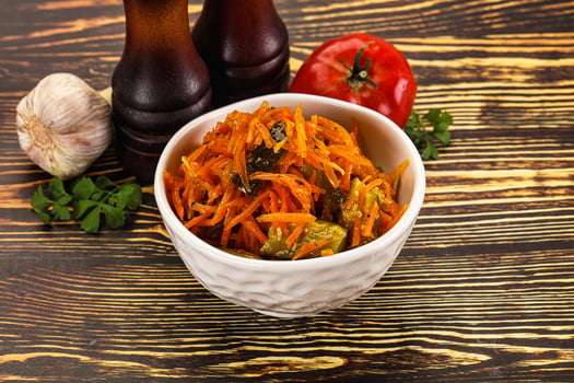 Salad with korean carrot and cucumber photo