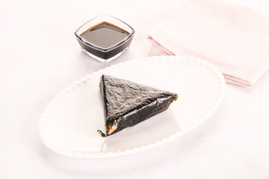 Japanese traditional onigiri with fish photo