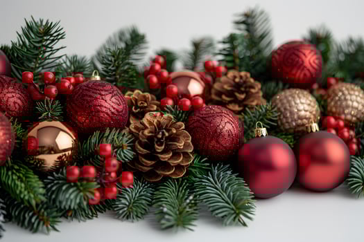 Festive Christmas Holiday Decorations with Red Baubles, Pine Cones, and Evergreen Branches - Ideal for Holiday Cards and Posters photo