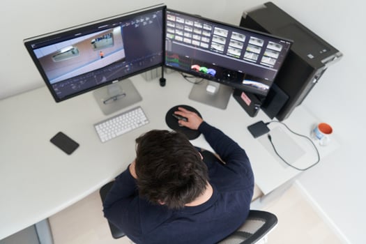 professional editor enhancing digital footage using specialized software photo