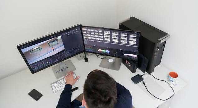 professional editor enhancing digital footage using specialized software photo