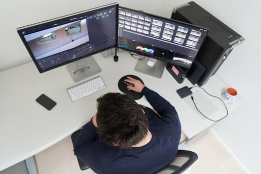 professional editor enhancing digital footage using specialized software photo