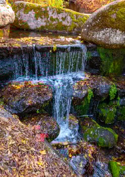 Small man-made waterfall in Sofievsky park, Uman, Ukraine photo