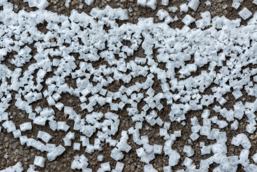 Crystals of self-precipitating common salt -sodium chloride- crystallized at the bottom photo