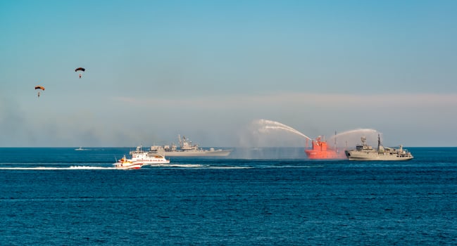 ODESSA, UKRAINE - JUNE 03, 2020 - training of fire ships in the Black Sea, a stream of water throws from the ship photo