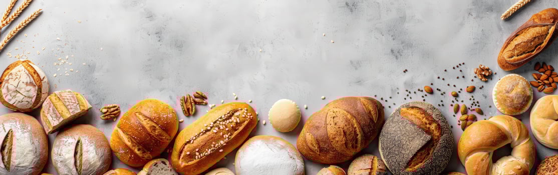 Freshly baked bread assortment displayed on a stone countertop photo