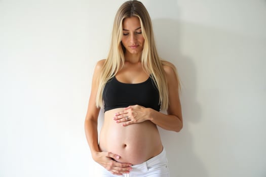 photo of pregnant woman standing pose on white background,