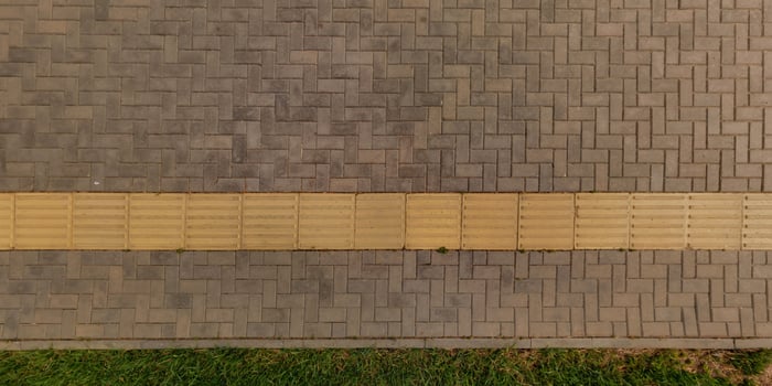 top view of surface of paving slabs and pedestrian footpath photo