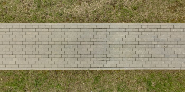 top view of surface of paving slabs and pedestrian footpath photo
