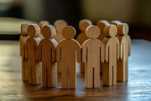A vibrant circle of intricately carved wooden figures symbolizes teamwork, unity, and the strength that comes from community collaboration and togetherness we all cherish in our lives photo