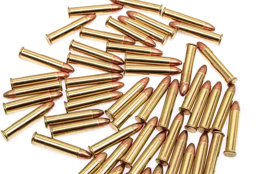 Small-caliber rifle cartridges isolated on white photo