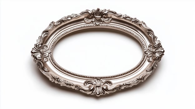 Side view of a vintage oval picture frame with a delicate lace like pattern and a slightly tarnished silver finish isolated on a white background with soft diffused shadows photo