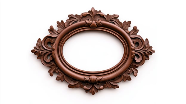Wide angle shot of a vintage oval shaped picture frame with elaborate carvings and patina featuring baroque style scrolls and leaves isolated on a pure white background photo