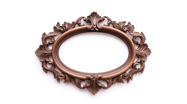 Wide angle shot of a vintage oval shaped picture frame with elaborate carvings and patina featuring baroque style scrolls and leaves isolated on a pure white background photo