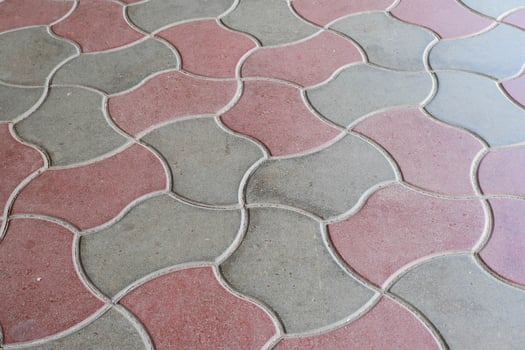 Red and green cement block floor background. photo