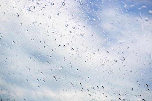 Drops on the glass after the rain. The texture is a drop. Place for text photo