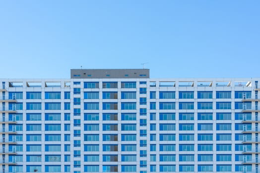 A modern glass building. Building texture in the city. photo