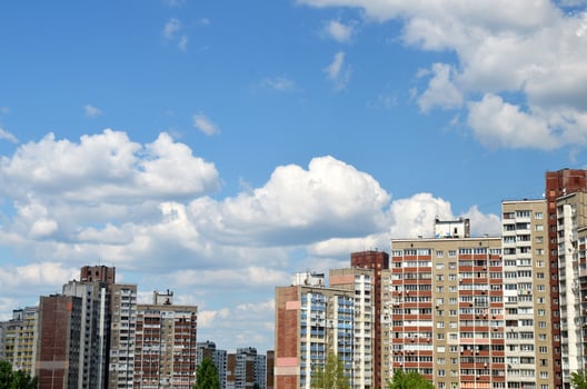 Apartment buildings under blue sky photo