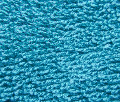 Blue fluffy cloth close view photo