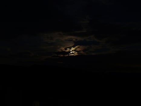 Moon Amongst the Clouds photo