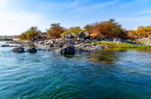 rocks and stones at the Nile River in Aswan, Egypt photo