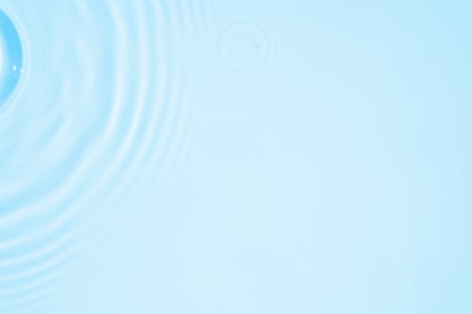 Abstract transparent water shadow surface texture natural ripple on blue background photo