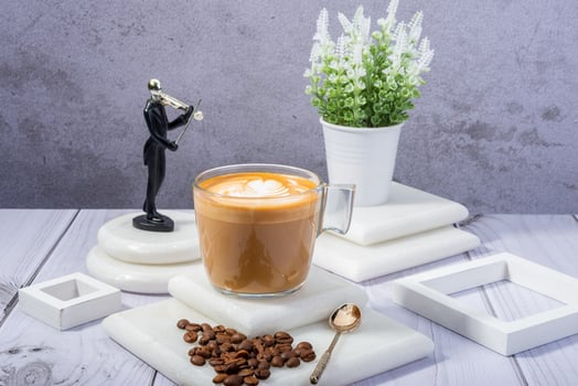 Elegant Latte with Coffee Beans and Vintage Clock on Wooden Table photo
