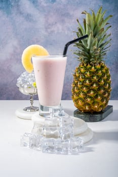 Pineapple Smoothie with Fresh Fruit and Granola photo