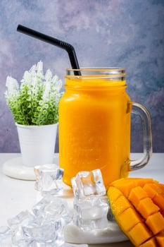 Mango Juice Smoothie with Ice Cubes photo