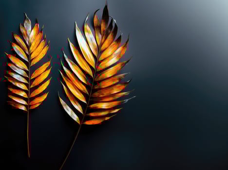 Vibrant autumn leaves with golden hues against a dark background photo