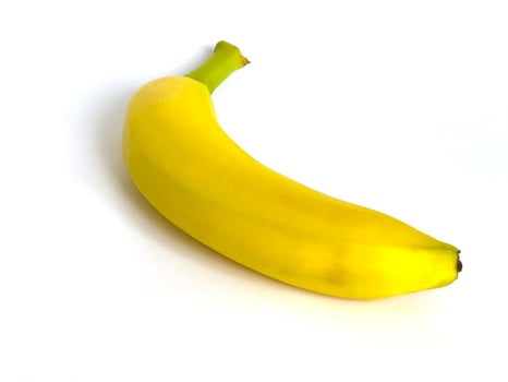 Ripe yellow banana isolated on white background with shadow. photo