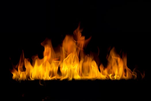 Bright Flame on Black Background photo