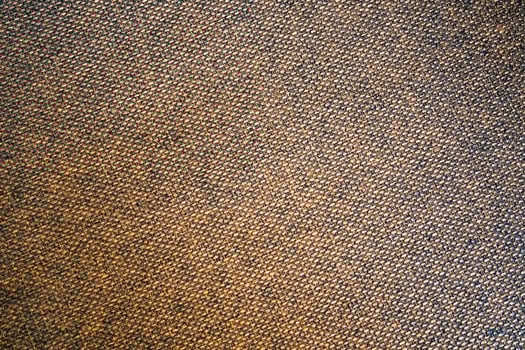 Close-Up Texture of Brown Fabric with Detailed Weave Pattern for Background or Design Elements photo