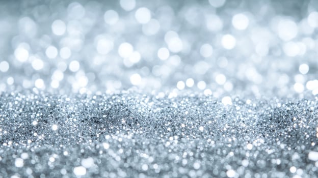 Snow white frosted background with delicate silver sparkle and glitter texture capturing the elegance of a Christmas winter wonderland atmosphere cold crisp and magical photo